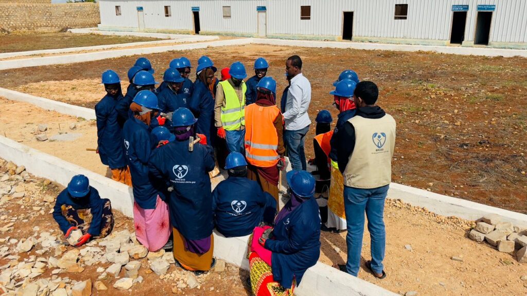 Female learners in Coble stone making